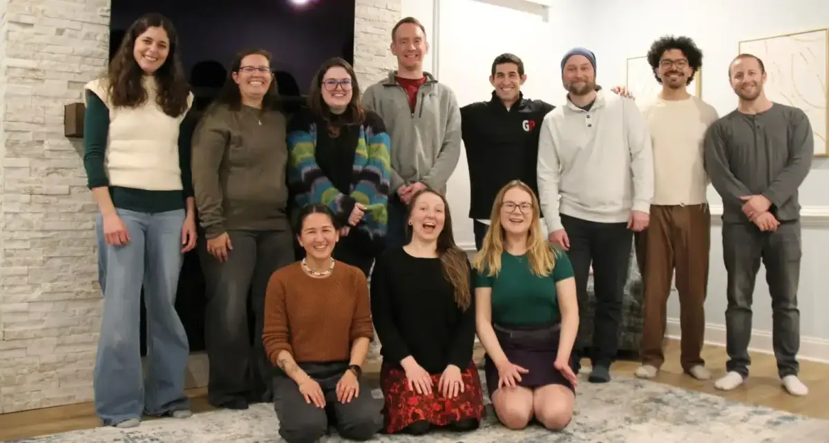 The GetPhound team standing together indoors